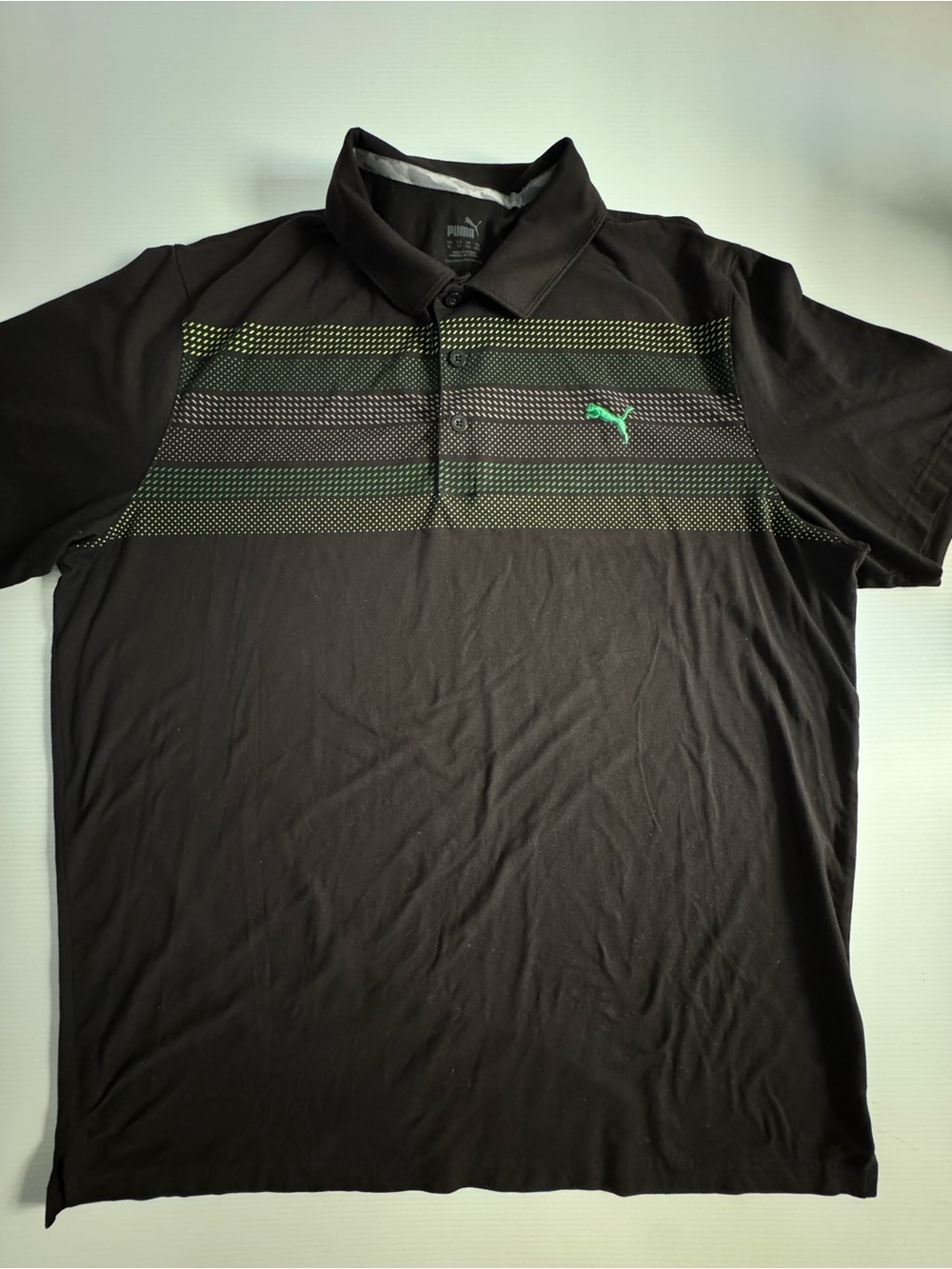 Puma Black Polo with Green Accent Stripes